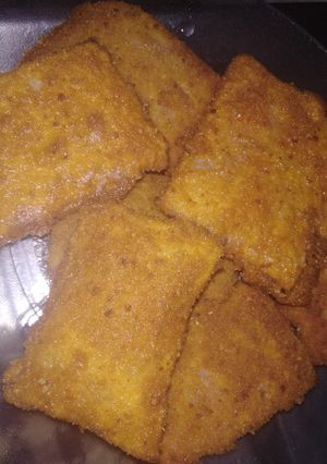 Una foto de Milanesas de jamón y queso