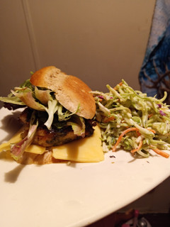 A picture of Grilled Chicken On Rye with Broccoli Slaw.