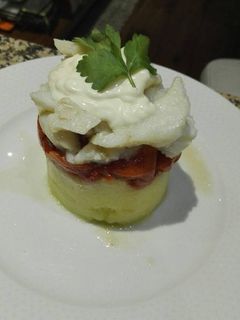 Una foto de Timbal de bacalao