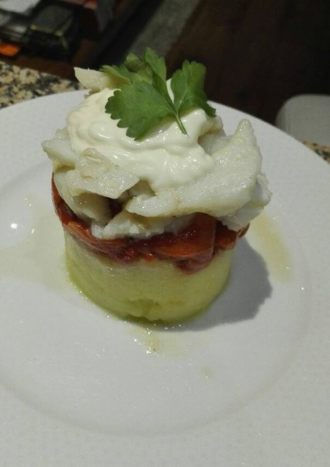 Una foto de Timbal de bacalao
