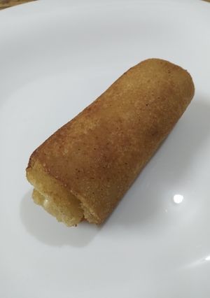 Una foto de Rollitos de pan, jamón y queso