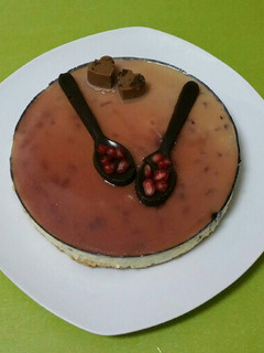 Una foto de Mousse de granadas y cobertura de moscatel