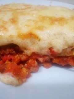 Una foto de Lasaña con soja y cilantro