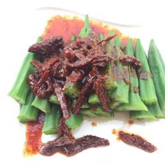 A picture of Okra With Sun Dried Tomato Spicy Sauce.