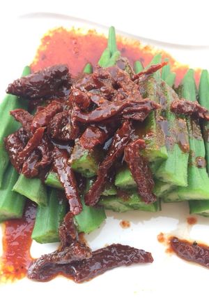 A picture of Okra With Sun Dried Tomato Spicy Sauce.