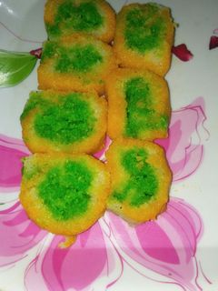 तिरंगा कोकोनट मलाई रोल (Tiranga coconut malai roll recipe in Hindi) रेसिपी मुख्य फोटो