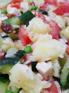 Una foto de Arroz tres delicias con calabacín y patata
