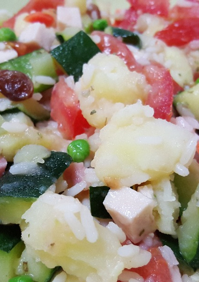 Una foto de Arroz tres delicias con calabacín y patata
