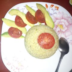 A picture of My special egg rice with ovacado and tomatoes.