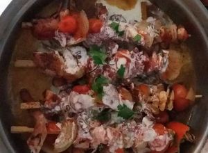 Una foto de Pulpo y el mar en su tinta y quesos