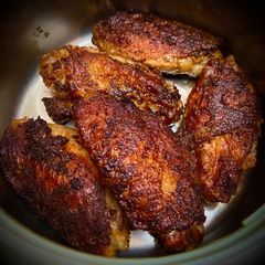 A picture of Tawa fried chicken wings.