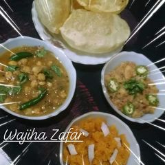 A picture of Kachori Bhaji(Halwa pori).