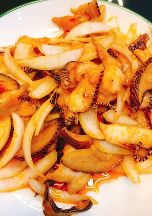Hình của món Ốc giác xào sa tế.