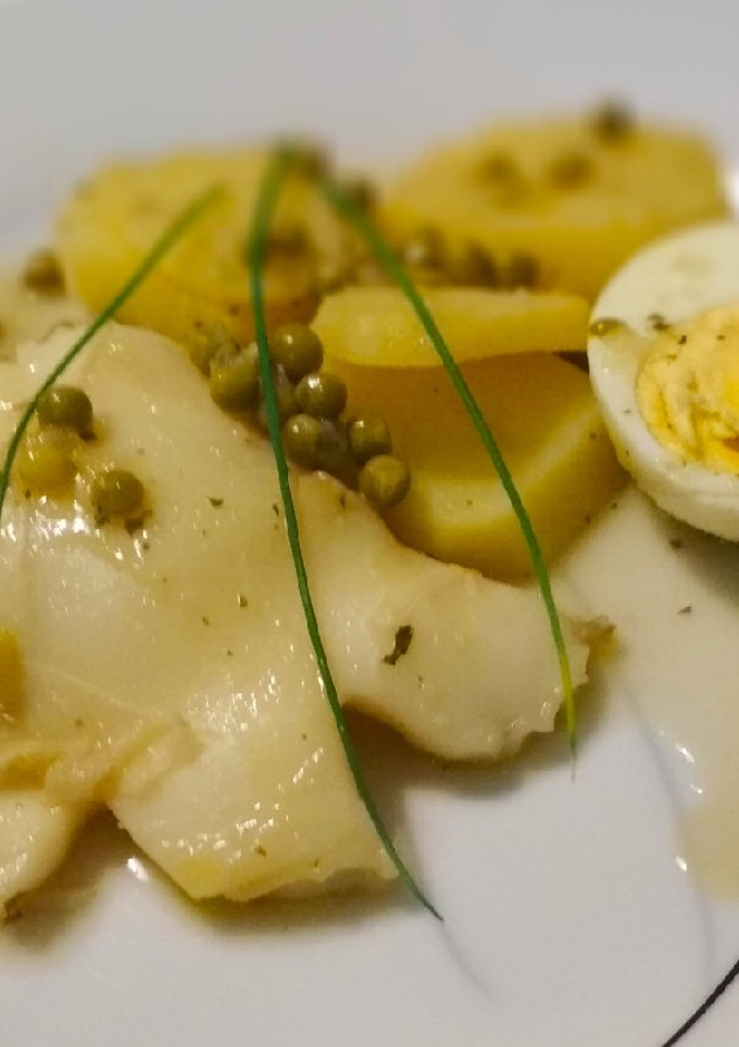 Una foto de Sepia con patatas en salsa verde