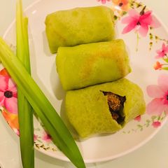 A picture of Kueh Dadar(Malaysian Stuffed Pancake).