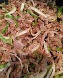 Bisteck con pimiento y cebolla