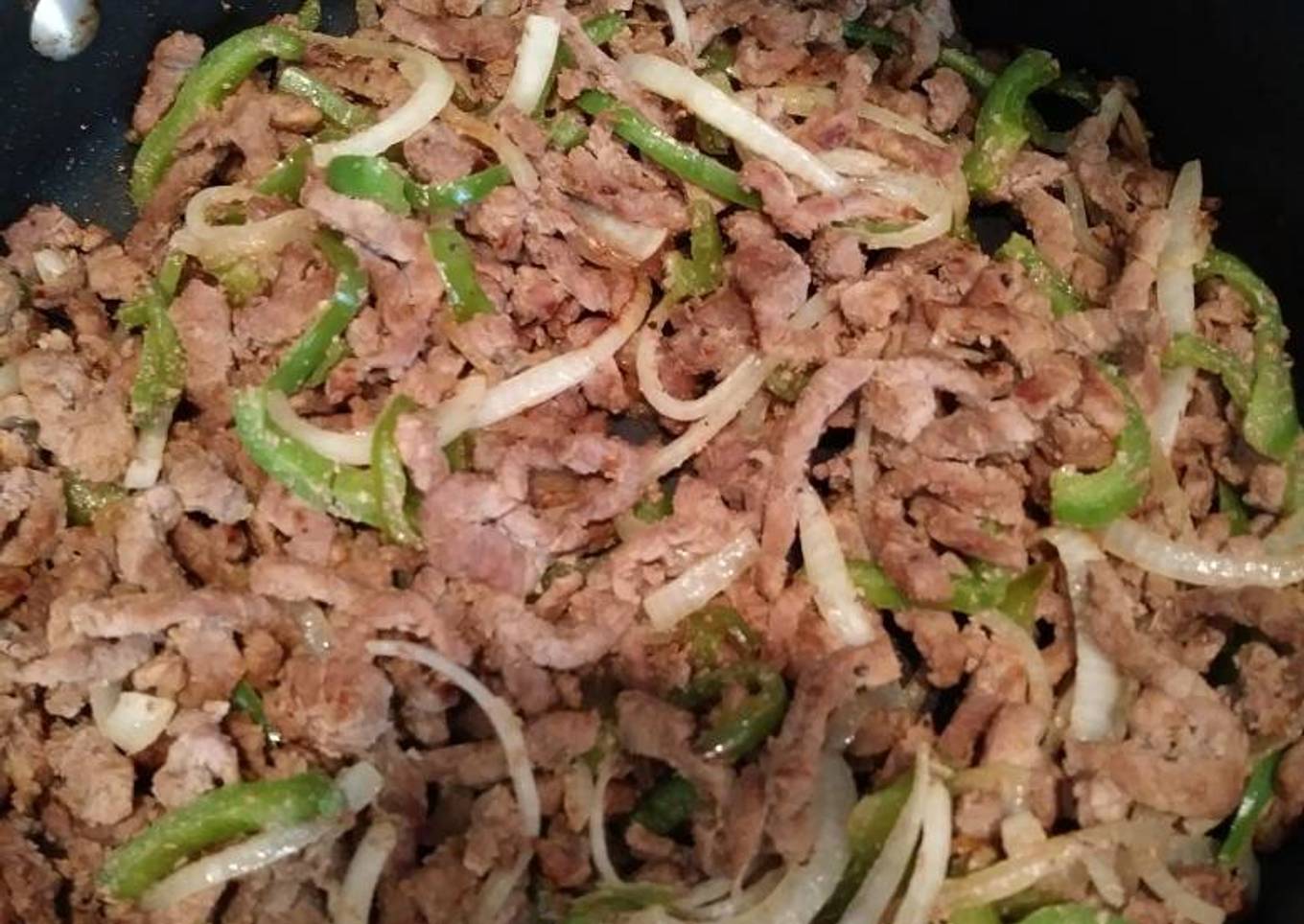 Bisteck con pimiento y cebolla