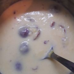 Custard with gulab jamun A picture of Custard with gulab jamun.