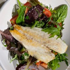 A picture of Pan Fried Sea Bass with a Parsley Salad 🥗.