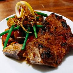 A picture of Steak and vegetables.