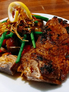 A picture of Steak and vegetables.