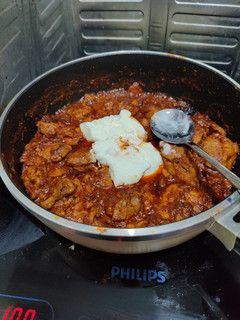 A picture of Chicken Pörkölt (Hungarian paprika stew).