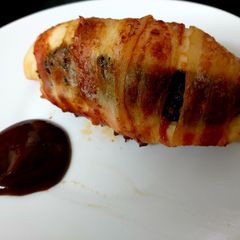 A picture of My Bacon Wrapped Stuffed Chicken Breast with Haggis 😍.