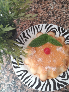 Una foto de 🍮🍎🍐🥥Flan de manzana y pera con coco