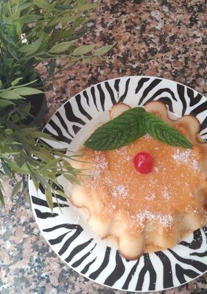 Una foto de 🍮🍎🍐🥥Flan de manzana y pera con coco