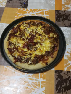 Una foto de Pizza kebab casero de pollo ternera y cerdo