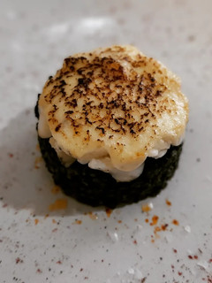 Una foto de Arroz negro con bacalao gratinado