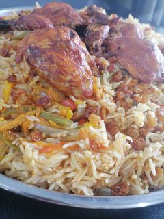صورة لوصفة كبسة دجاج بالفرن