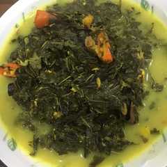 รูปของ Daun singkong bumbu kuning