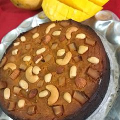 A picture of Mango baked Poda Pittha.