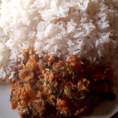 A picture of Boile rice with egg sauce.