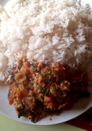 A picture of Boile rice with egg sauce.
