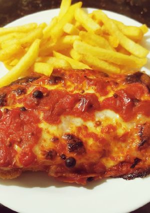 Una foto de Milanesa de pollo a la napolitana