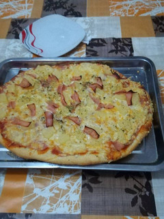 Una foto de Pizza hawaiana