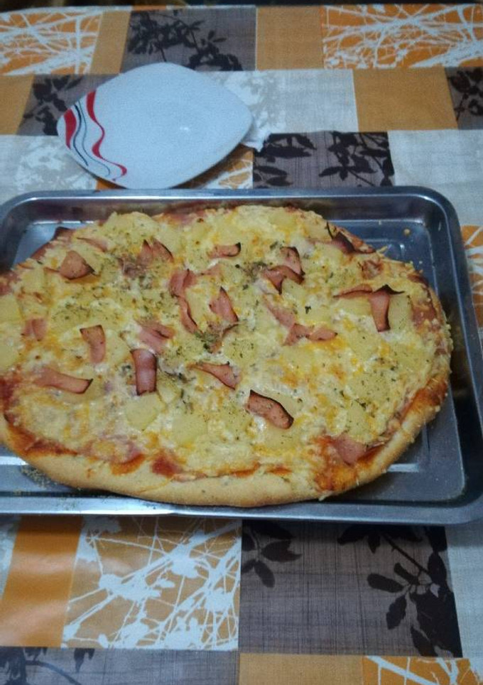 Una foto de Pizza hawaiana