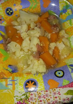 Una foto de Col con calabaza, cebolla y jamón