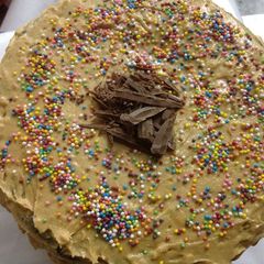 A picture of Eggless cake with Peanut Butter frosting.