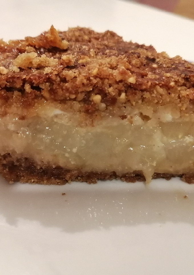 Una foto de Tarta de pera con crumble de almendras