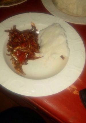 A picture of Dry fried omena (Lake Victoria sardine) with ugali.