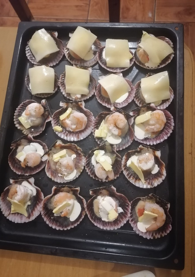Una foto de Ostiones a la parmesana