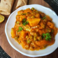A picture of Instant Pot Aloo Matar Masala (In Pressure Cooker) !!.