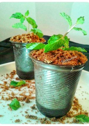 A picture of Chocolate pot with chocolate mousse.