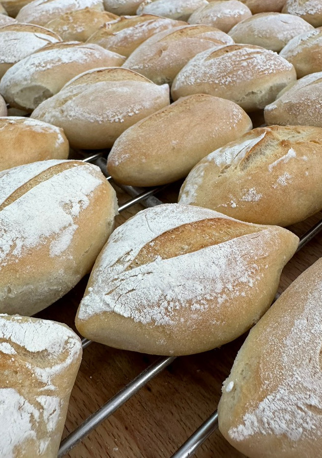 Una foto de Pan flama (pan común)