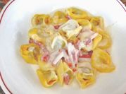 Una foto de tortellini de carne