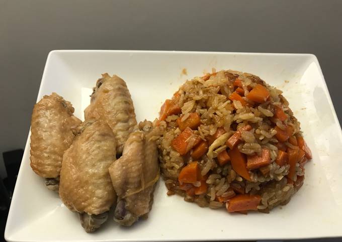 Rice with carrots and chicken wings