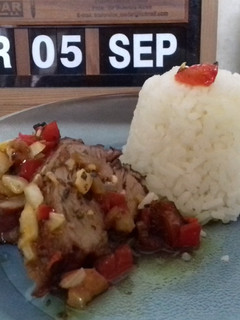 Una foto de Colita de cuadril con salsa criolla